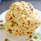 Whole Roasted Cauliflower with Cheese Sauce