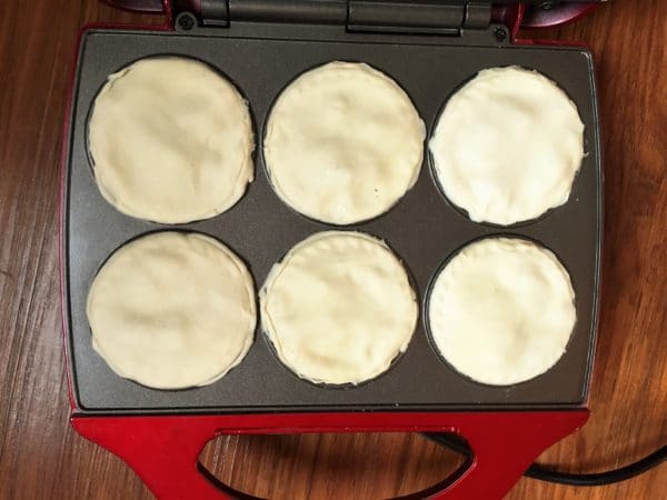 6 mini mushroom pies in a pie maker