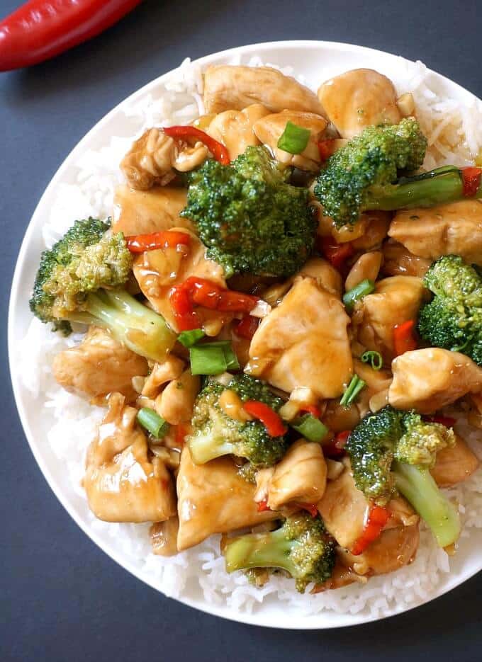 Overhead shoot of a white plate with Chinese Chicken and Broccoli Stir Fry with Rice