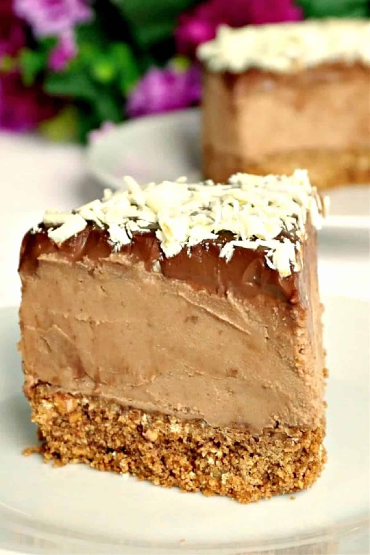 A slice of chocolate cheesecake on a white plate