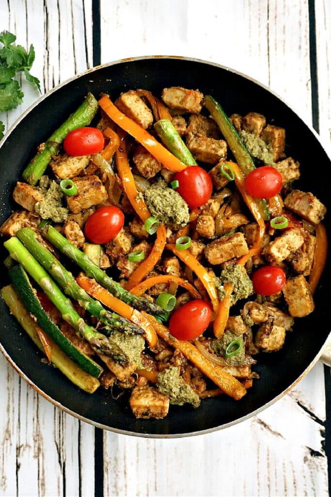Overhead shoot of a frying pan with quorn pieces and vegetables