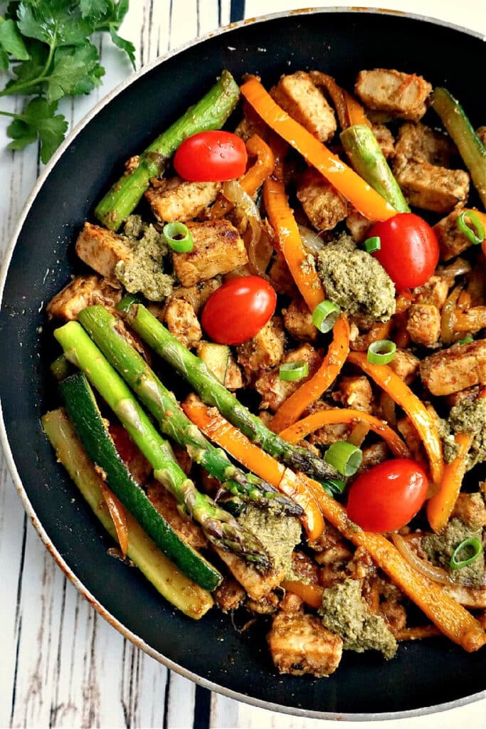 A frying pan with quorn pieces and veggies