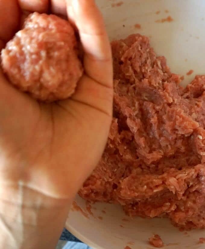 Shaping meatballs for the Romanian Meatball Soup