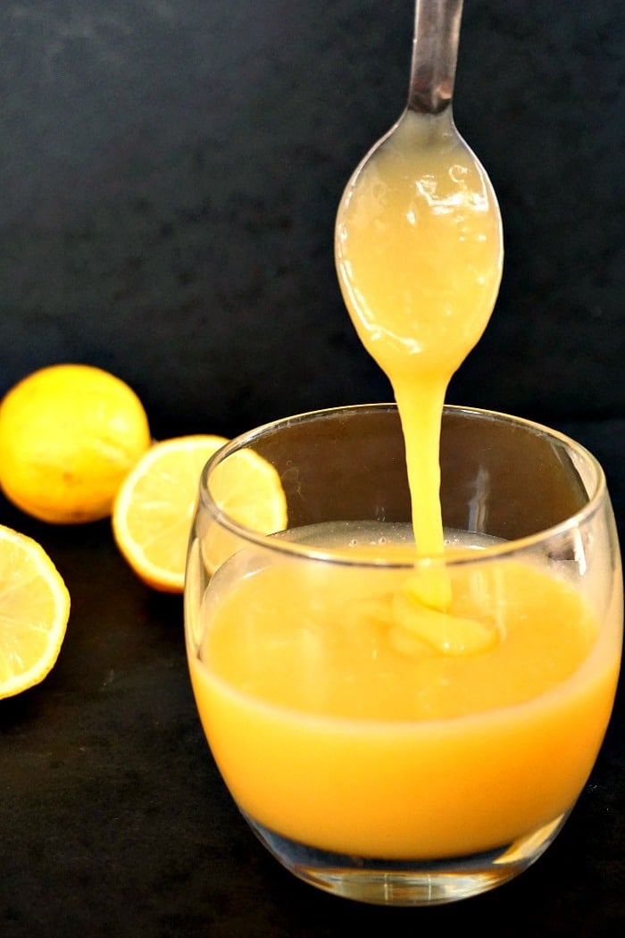 A glass of homemade lemon curd