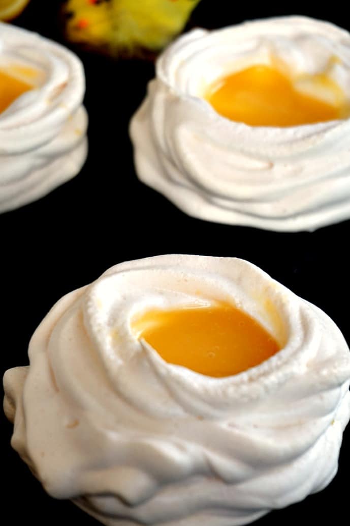 Meringue nests with lemon curd.