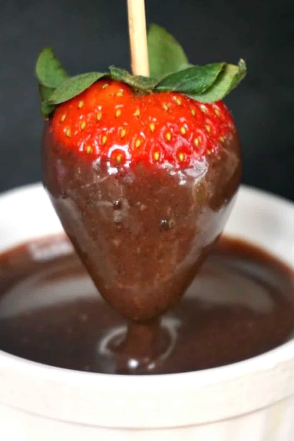 The best homemade chocolate dipping sauce that is rich, heavenly flavourful and so chocolatey. It's so easy and quick to make, and this chocolate sauce is great for fruit, strawberries in particular, churros or drizzled over ice cream or your favourite dessert. The only chocolate sauce recipe you need for a dinner date or any ther celebration. #chocolatesauce, #chocolatedippingsauce, #homemadechocolate, #chocolate
