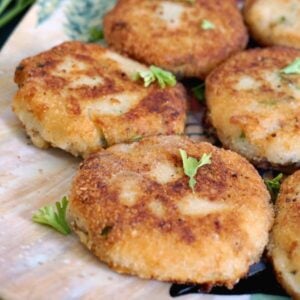 A plate with 5 mashed potato tuna patties