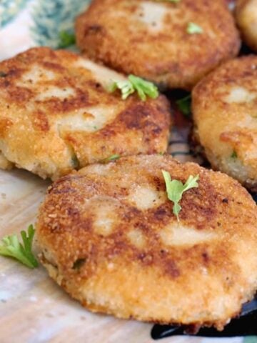 A plate with 5 mashed potato tuna patties