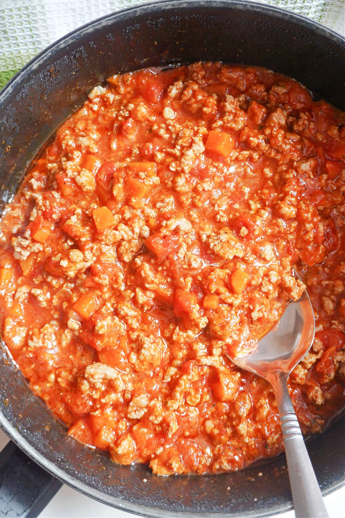 A pan with bolognese sauce.