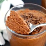 A glass of Vegan Chocolate Mousse with aquafaba, a guilt-free dessert that is low in calories, quick and easy to make. So fluffy, light, yet indulgent and chocolatey. No bake, and with only 3 ingredients.