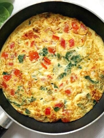 Overhead shoot of a pan with vegetarian omelette
