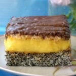 A slice of cake on a white plate