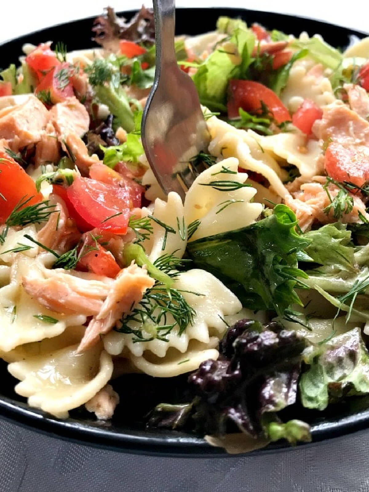 Close-up shoot of salmon pasta salad.