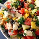 A white bowl with Mediterranean chickpea salad