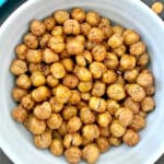 A light blue bowl with roasted chickpeas