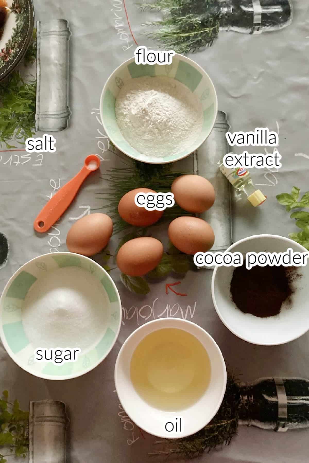 Ingredients needed to make chocolate swiss roll.