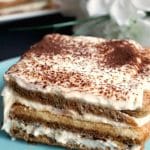 Easy Tiramisu Recipe, my take on the classic Italian dessert, but with no alcohol and no eggs. This no-bake dessert is so indulgent and heavenly rich, made with those layers of coffee-soaked ladyfingers and silky mascarpone filling. It's a must-have dessert for any party or celebration. Ready in about 10 minutes. my tiramisu is the best dessert you can get. A family-favourite dessert no matter the season. #tiramisu, #dessert, #egglessdessert, #mascarpone, #italiandessert, #nobakedessert