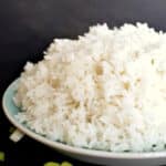 A light blue plate with basmati rice