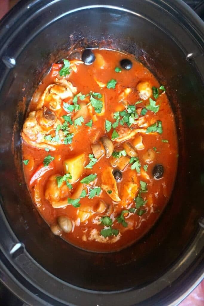 Overhead shoot of a slow cooker with chicken stew