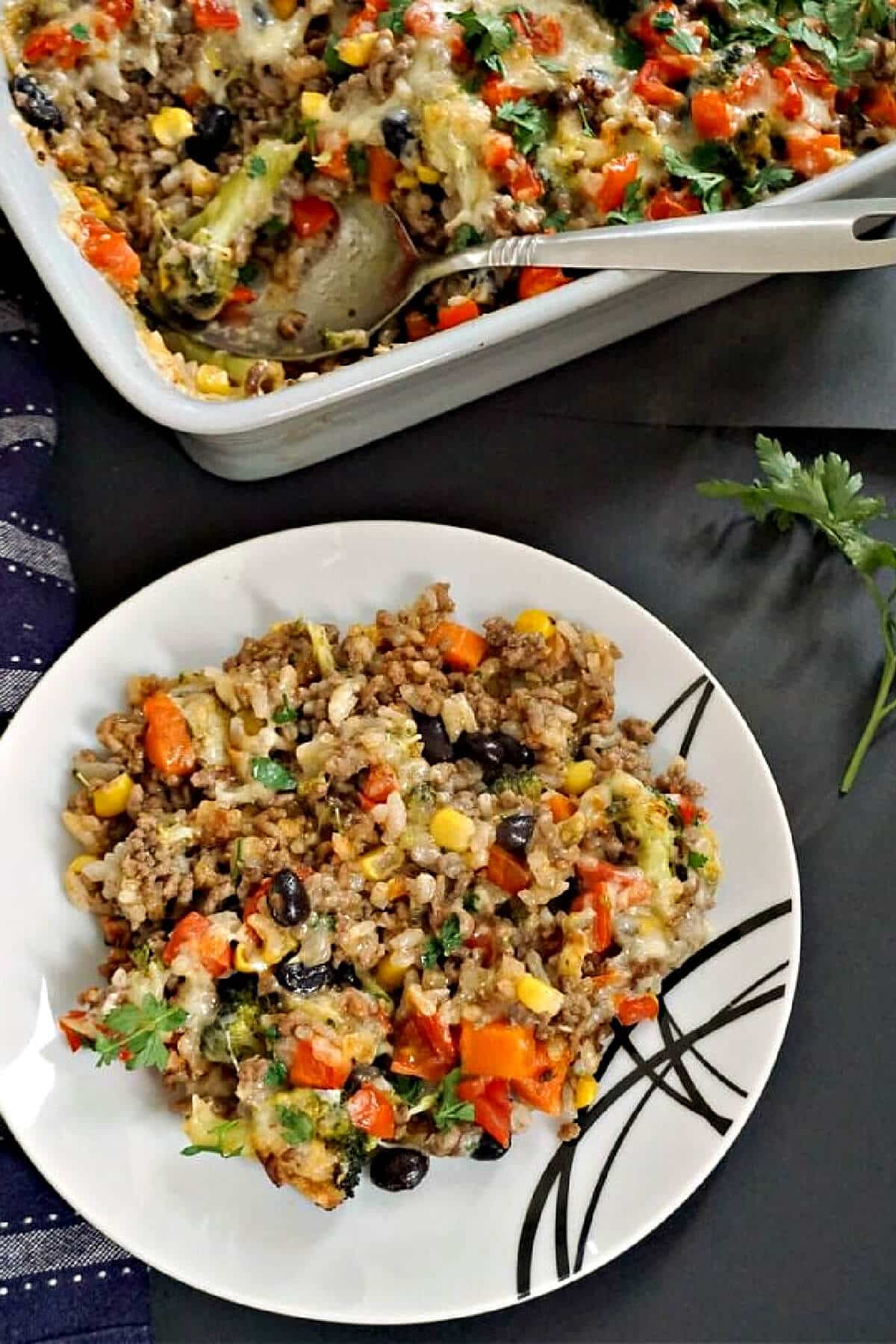 Overhead shoot of a white plate with rice and beef mince and a dish with more rice.