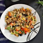 Overhead shoot of a white plate with rice and beef casserole