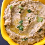 A yellow pepper-shaped bowl with aubergine dip