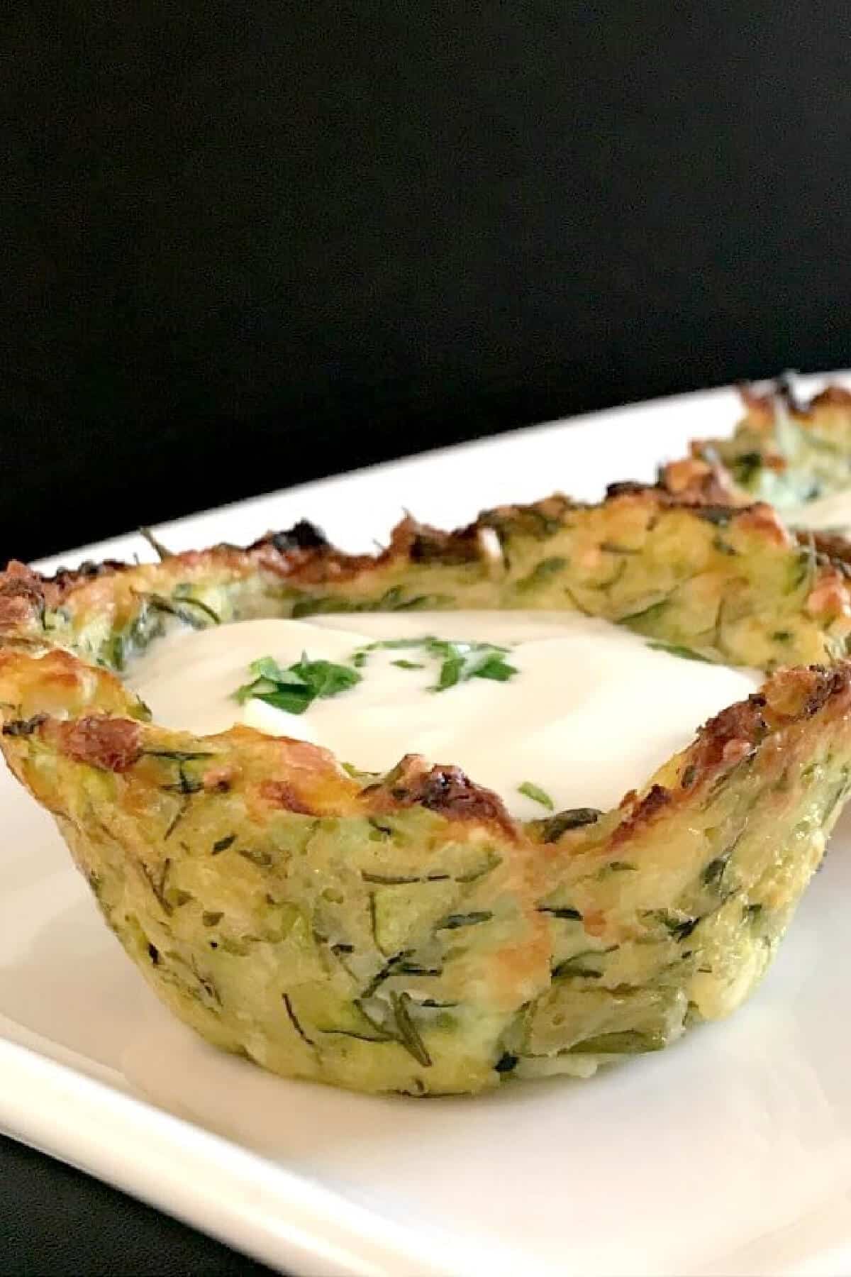 A zucchini cup filled with yogurt.