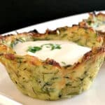 A zucchini cup filled with yogurt