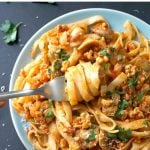 Pancetta, Chicken and Mushroom Tagliatelle, a delicious pasta dish for a quick and easy dinner. The tomato sauce is rich and flavourful, making this recipe a big hit even with fussy eaters.