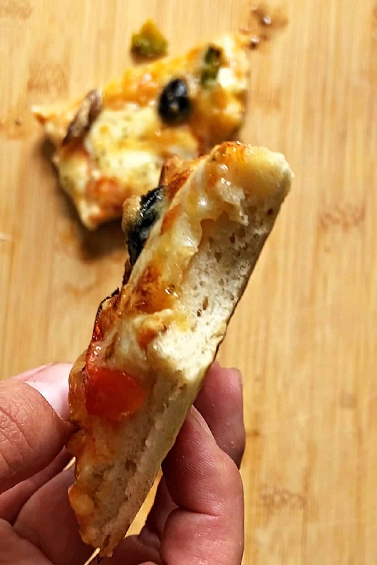 A slice of pizza to show how well it's cooked.