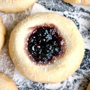 A thumbprint cookie filled with jam
