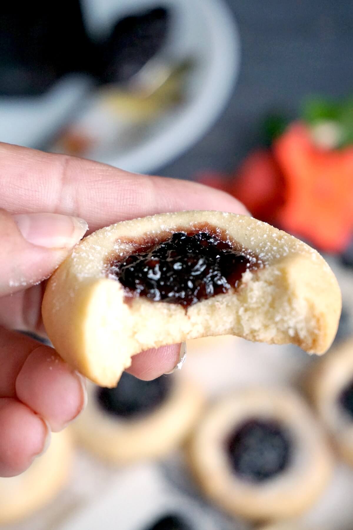 Half of a thumbprint cookie to show how it looks like inside.