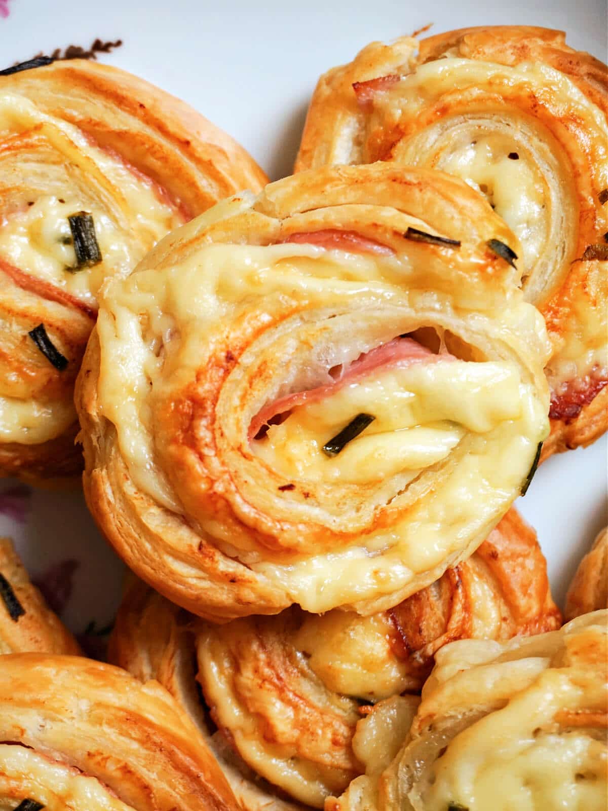 Close-up shoot of ham and cheese pinwheels.