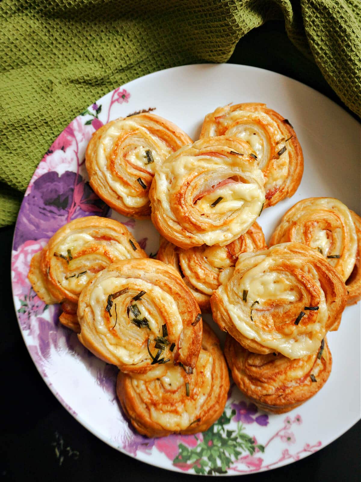 A plate with a pile of pinwheels.
