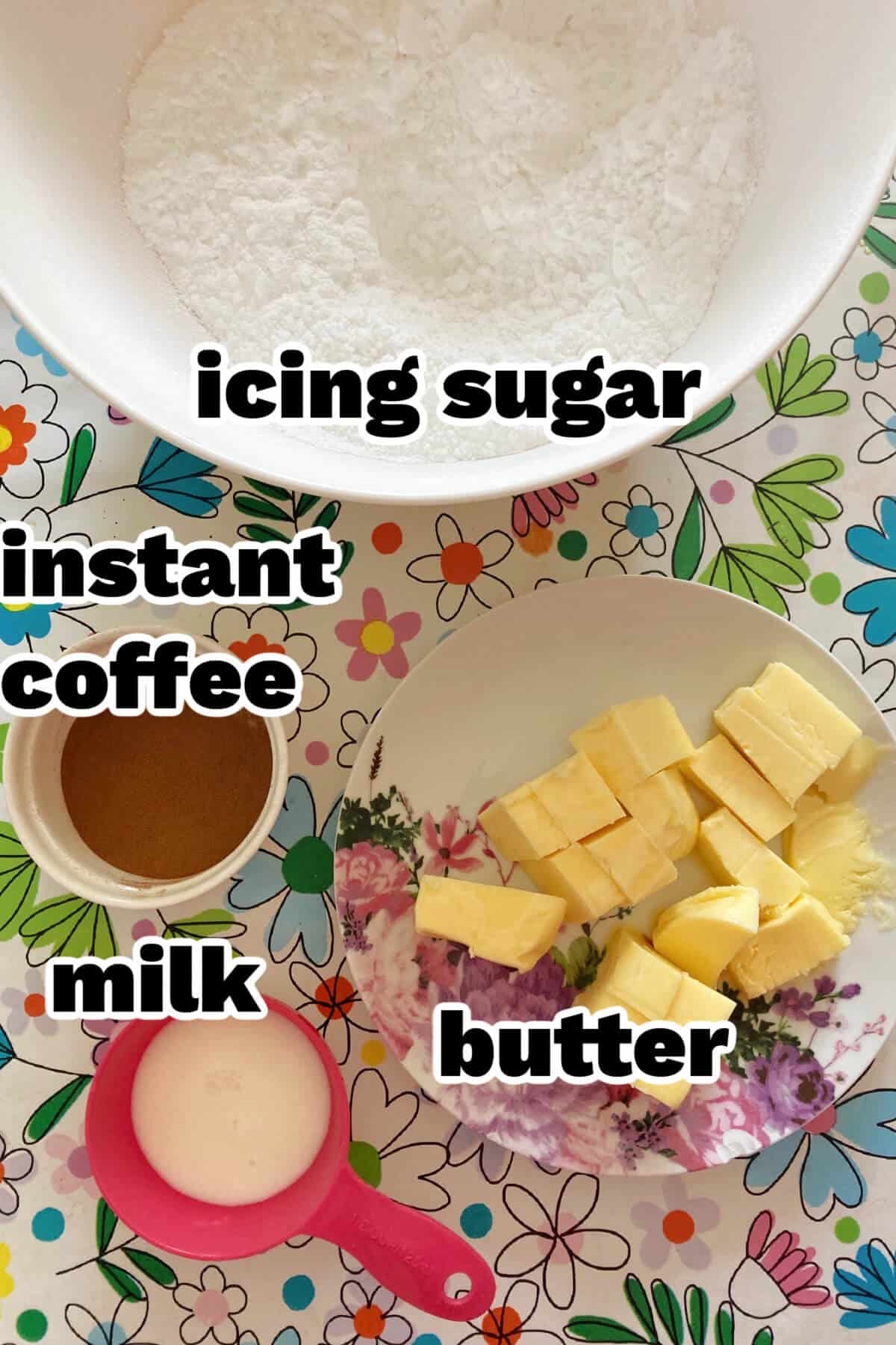 Ingredients needed to make coffee buttercream icing.