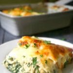 Leftover Chicken, Spinach and Artichoke Lasagna in a cheesy and creamy bechamel sauce, a delicious and easy dinner that takes comfort food to the very next level. In you like the classic spinach and artichoke dip, you will love with chicken lasagna with a twist. Perfect layers of no-boil lasagna sheets, creamy chicken filling and then baked to perfection until bubbly hot. My kind of dinner! #lasagna, #chickenlasagna, #spinachandartichoke, #comfortfood, #chickendinner, #bechamelsauce, #rotisserie