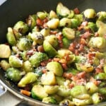 A pan with brussels sprouts, bacon and parmesaan