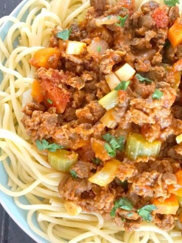 A plate with spaghetti topped with quorn bolognese