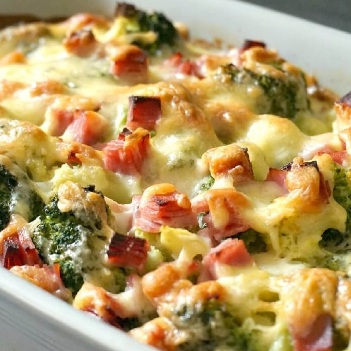 A dish with ham and broccoli bake