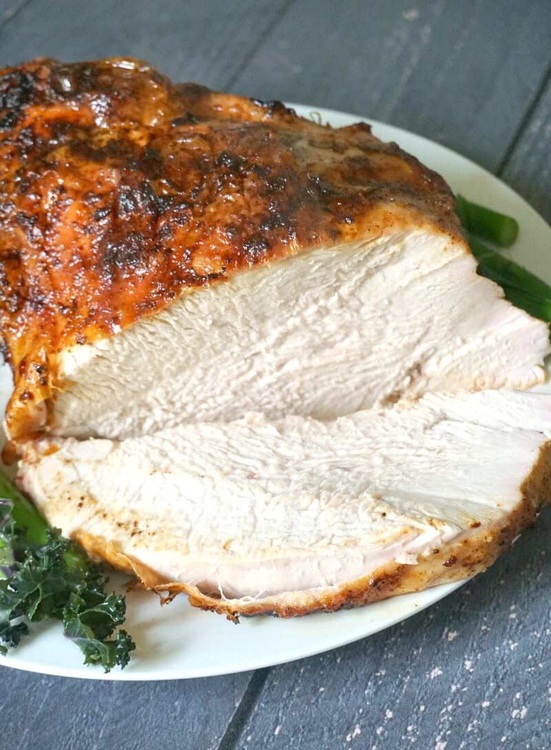 A roast rurkey crown carved on a white plate
