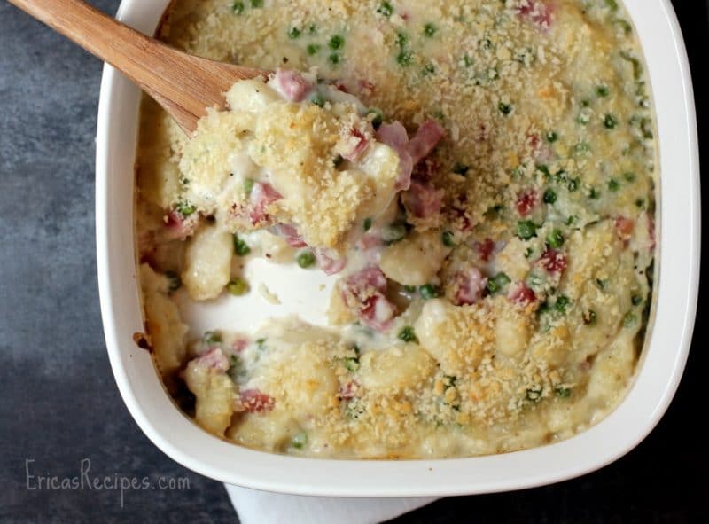 A casserole of gnocchi mac and cheese with leftover ham and peas.