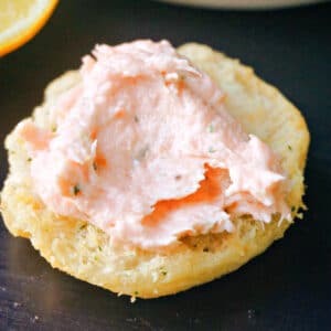 A round crostini with smoked salmon pate.