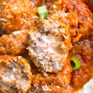 Close-up shoot of meatballs stuffed with mozzarella