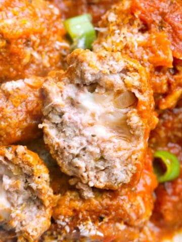 Close-up shoot of meatballs stuffed with mozzarella