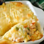 Close-up shoot of a dish with mashed potato fish pie.