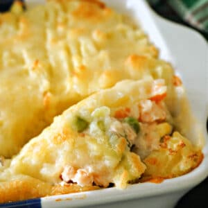 Close-up shoot of a fish pie topped with mashed potatoes.