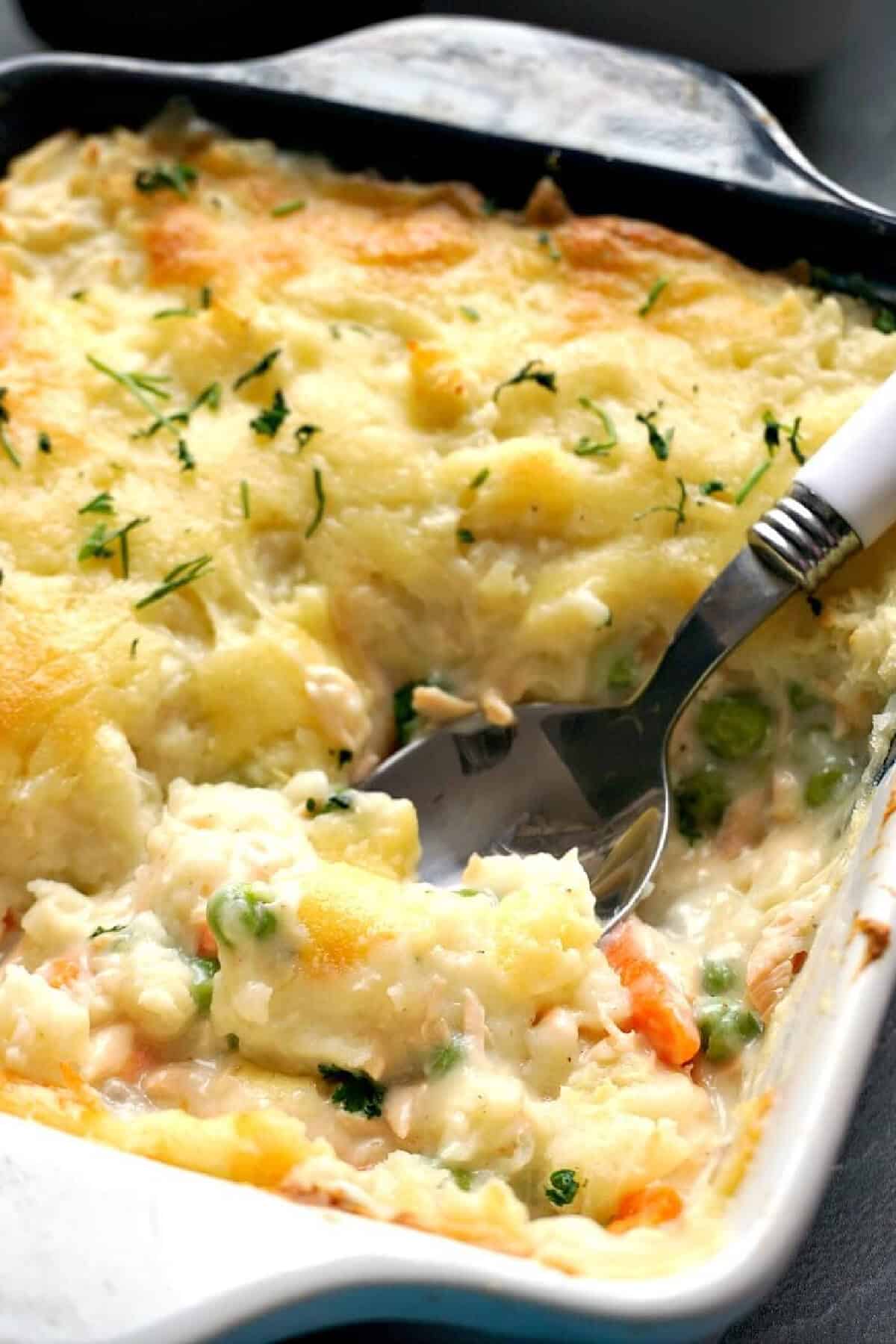 Close-up shoot of a dish with fish pie .