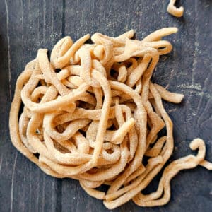 A nest of noodles on a table top