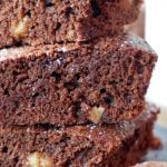 Walnut Brownies, a classic dessert that can be made at home from scratch in about 30 minutes. It has a light, chocolaty sponge with crunchy walnut pieces, so indulgent, hard to resist not having one too many brownies. Cut them in squares, or bake them as a cake, the result is the same scrumptious dessert. No need to buy the boxed kind, the homemade brownies are the real treat. #chocolatebrownies, #walnutbrownies, #chocolatedessert, #dessert