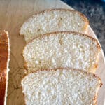 3 slices of bread on a wooden board